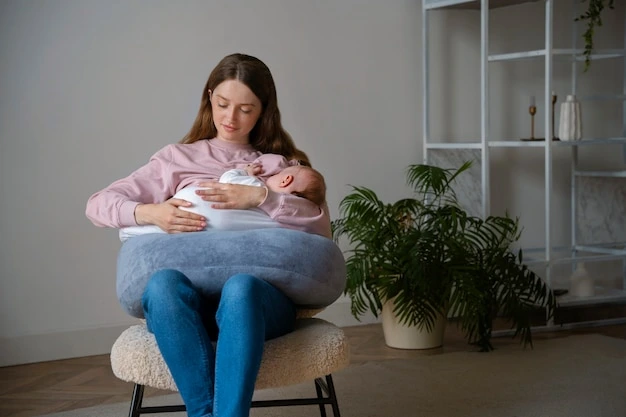 A mother and infant in a calming Ayurvedic setting.